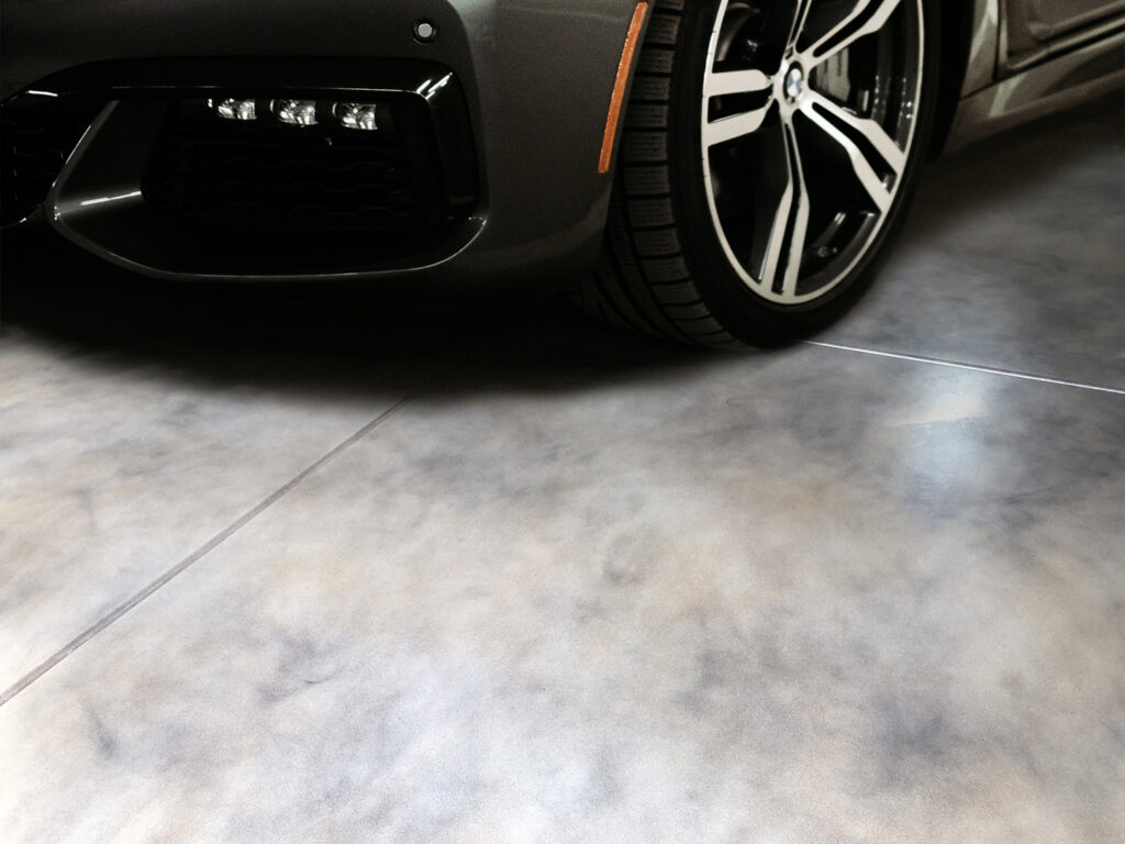 Car parked on sealed garage concrete floor